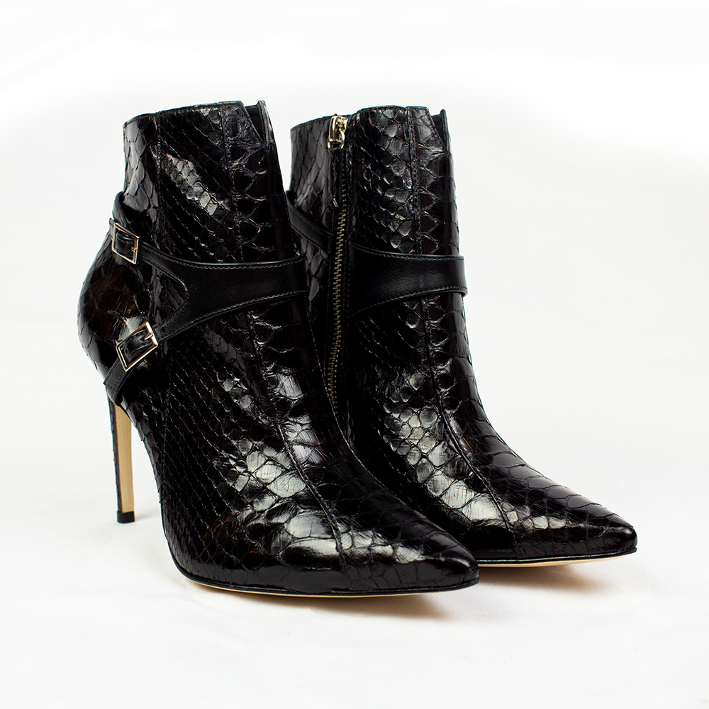 Picture of a pair of Sam Prado high heel black leather boots